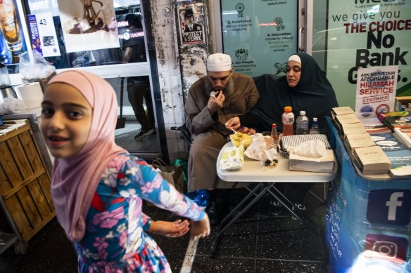 Aiman and Salma Hampton with their daughter Farah enjoying Ramadan Nights in Lakemba.