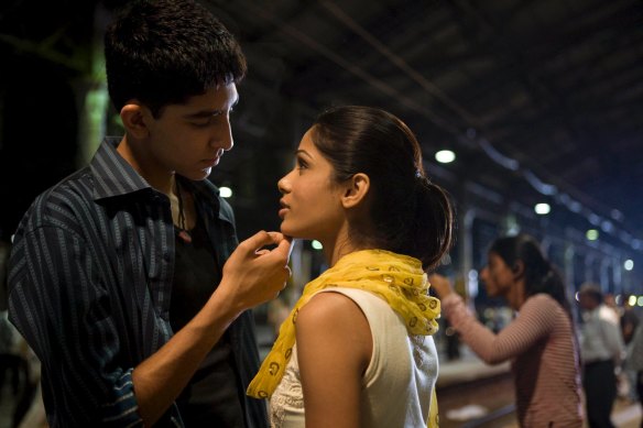 A young Dev Patel with Freida Pinto in the Oscar-winning Slumdog Millionaire. 