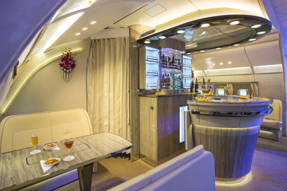 If you manage to snag the table for four at the Emirates bar on board its Airbus A380, don’t hog it. 
