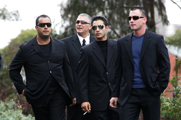 Mick Gatto (second from left) arrives at Saint Ignatius Church in Richmond for the funeral of Mario Condello in 2006.