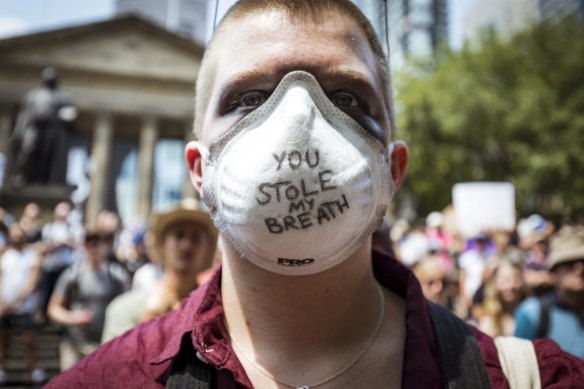 Stealing their thunder?: A climate change protester in Melbourne during the height of the bushfires.