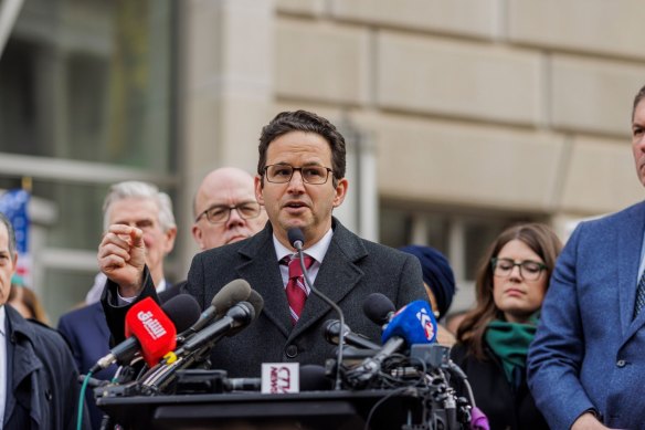 Senator Brian Schatz, a Democrat from Hawaii, speaks outside the USAID headquarters in Washington, DC.