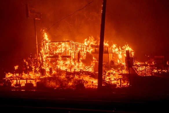 A structure burns during the Palisades Fire in the Pacific Palisades neighbourhood of Los Angeles, during the 2025 wildfires. 