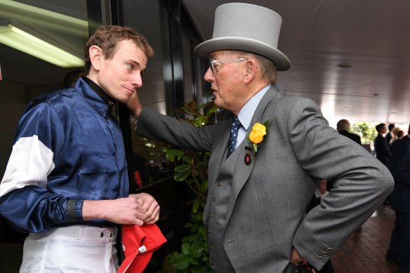 Lloyd Williams, right, with jockey Ryan Moore at the 2016 Melbourne Cup. 