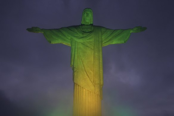Rio de Janeiro’s Christ the Redeemer statue is lit with the colours of the Brazilian flag to pay homage to Pelé.