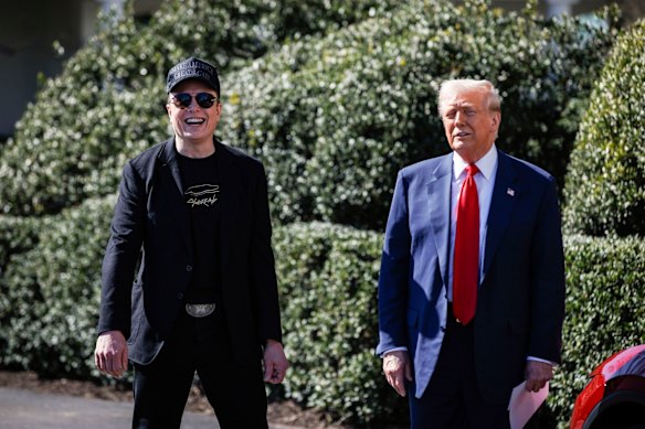 Happier times: Chief executive officer of Tesla Elon Musk and US President Donald Trump.