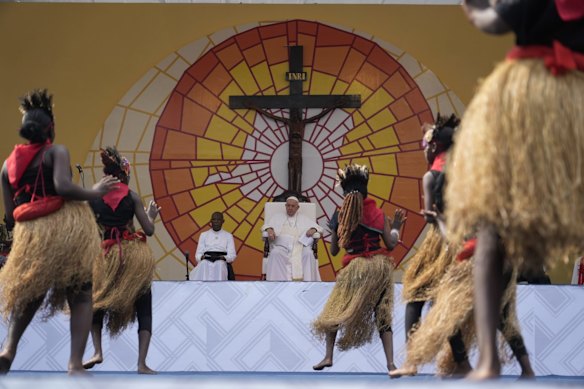 Pope Francis watches traditional dancers performing at the Martyrs’ Stadium In Kinshasa, Democratic Republic of Congo, in February 2023.