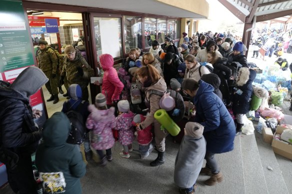 Refugees from Ukraine arrive at the railway station in Przemysl, Poland.