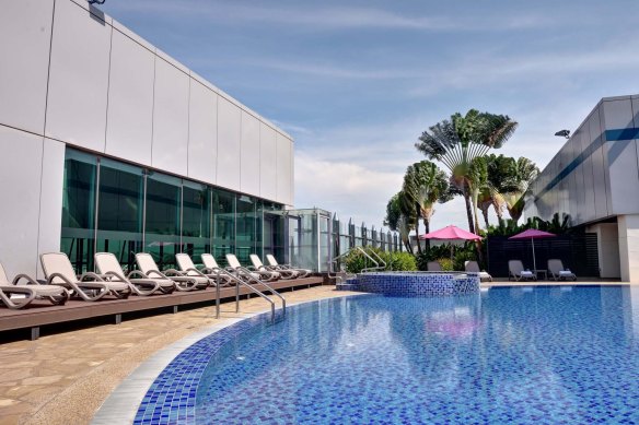 Swimming pool, with a bar, at Singapore Changi Airport. 