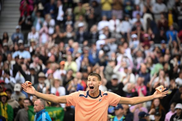 Alexei Popyrin celebrates beating American Taylor Fritz.