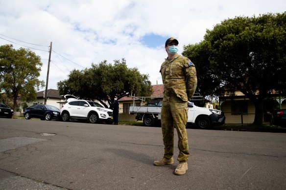 The Police and ADF conduct checks in Lakemba in August to see if people are home who are meant to be in isolation.