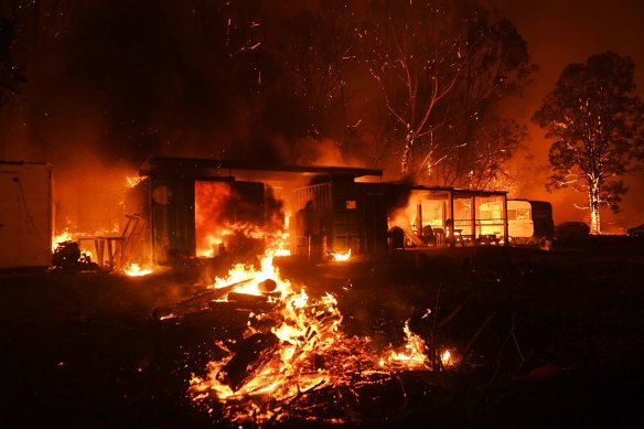 Sheds were engulfed by flames, but houses were spared.