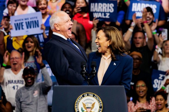 US Vice President Kamala Harris, right, and Tim Walz, governor of Minnesota and Democratic vice-presidential nominee, during a campaign event in Philadelphia. 