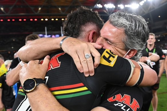 Nathan Cleary of the Panthers hugs his father and coach Ivan Cleary after winning the 2021 NRL grand final.