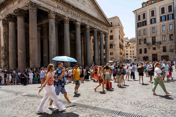 Tourists in Rome, Italy, where foreigners and citizens receive free healthcare.