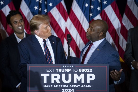 Senator Tim Scott, a Republican from South Carolina, right, with Donald Trump