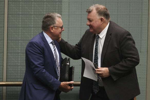 Craig Kelly talks to Labor’s Joel Fitzgibbon (left), a fellow spruiker of coal. Kelly’s decision to sit as an independent allows him to form opportunistic alliances.