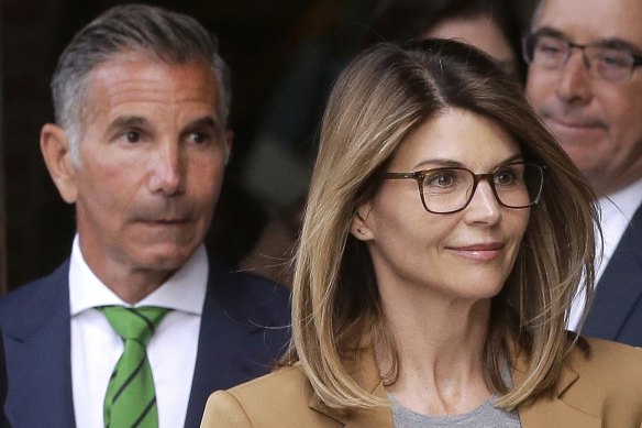 Lori Loughlin and her husband Mossimo Giannulli, pictured in 2019.