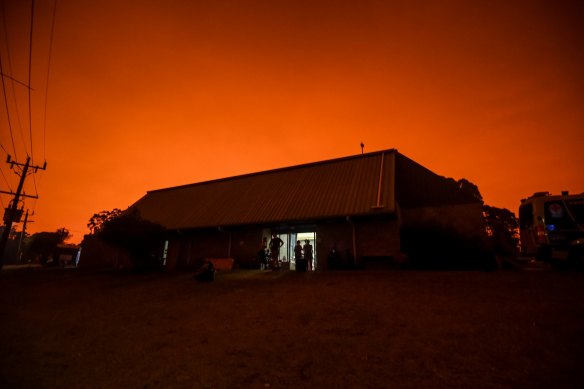 The sky above Mallacoota blazes red amid the fire danger.