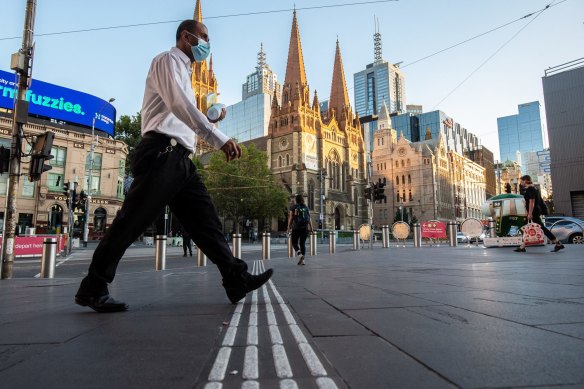 Commuters returning to Melbourne CBD after February’s five-day lockdown. 