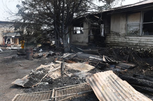 A damaged home and property on the Bells Line of Road at Berambing in December.