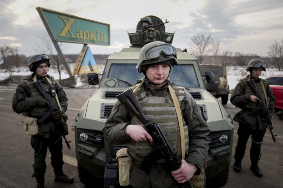 Ukrainian National guard soldiers guard a mobile checkpoint.