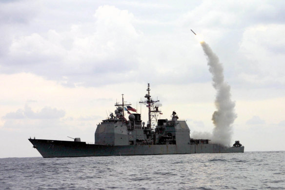 A Tomahawk Land Attack Missile launches from the guided missile cruiser USS Cape St George.