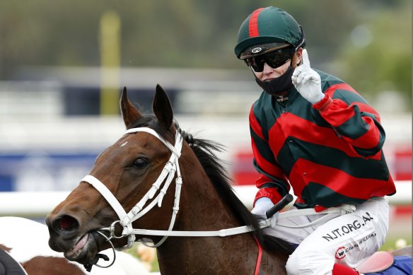 Craig Williams returns to scale on September Run after her Coolmore Stud Stakes win.