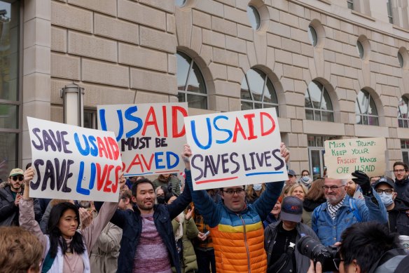 Demonstrators outside the US Agency for International Development (USAID) headquarters in Washington.