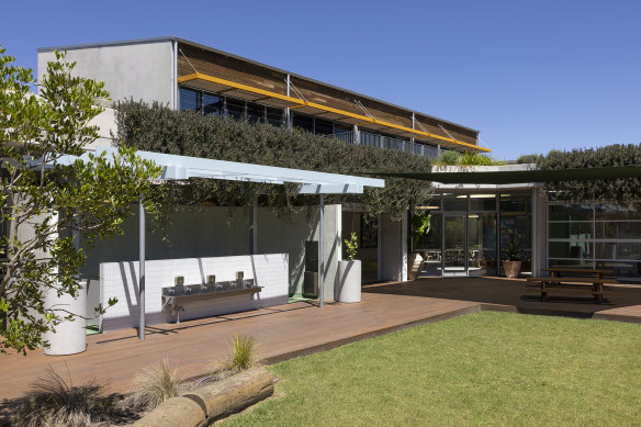 The Rouse Hill Childcare Centre retained the original scheme’s tilt-slab concrete walls, adding a few simple details such as vibrant orange trims.