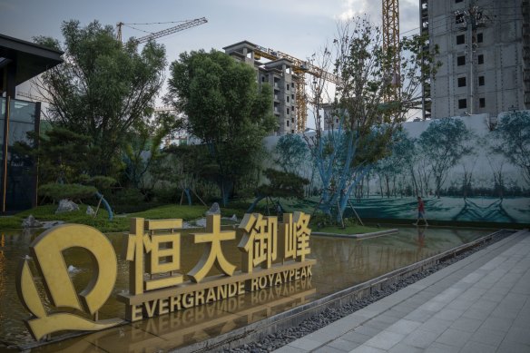 China Evergrande’s collapse is emblematic of the debt-fuelled property boom, which the government in Beijing is trying to rein in without derailing the entire economy.