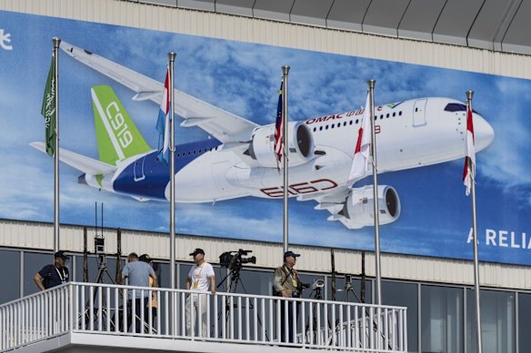 An ad for the COMAC C919 aircraft during the China International Aviation and Aerospace Exhibition in Zhuhai, China.