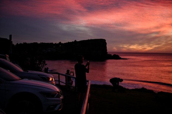 A red sunrise at Avalon ahead of a warm day on Friday and a warmer weekend.