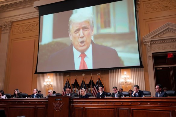 A video of former US president Donald Trump displayed on a screen during the hastily arranged hearing. 