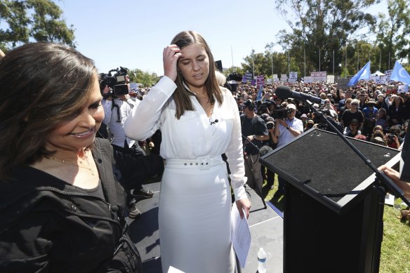 Brittany Higgins with Lisa Wilkinson as she takes the stage at the Women’s March 4 Justice at Parliament House in March 2021.