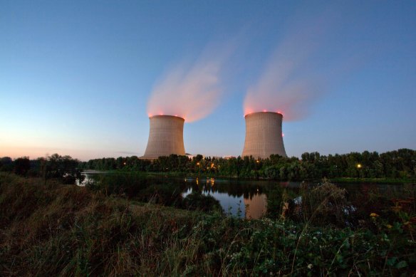 Vapor rises from cooling towers at the Saint-Laurent-des-Eaux nuclear power plant in France. 