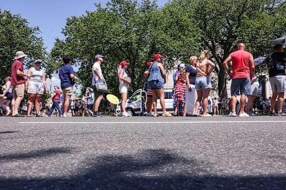 People wait in line to enter the National Mall in Washington on Saturday.
