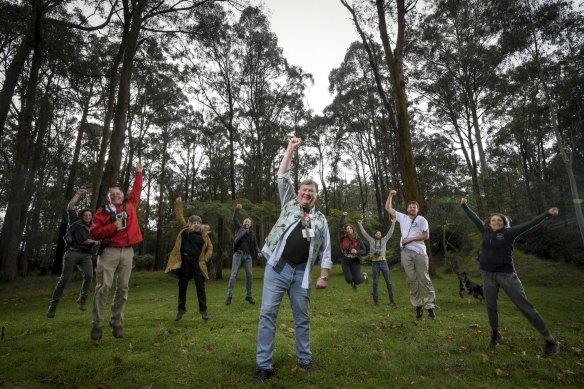 Steve Meacher ( centre ), the chair of Friends of the Leadbeater Possum and other members in Toolangi after their court win. 
