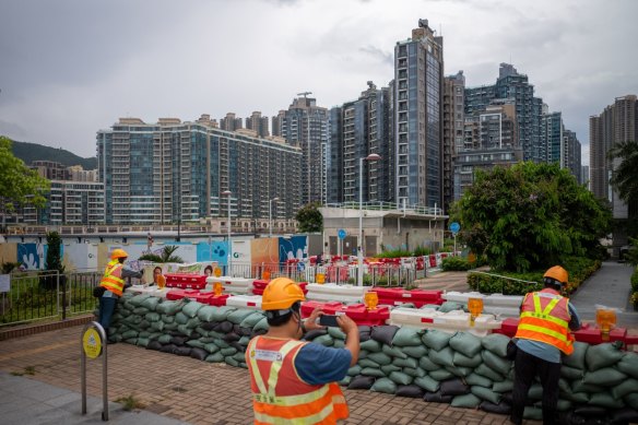 Residential areas of Hong Kong have been sandbagged ahead of Saola’s arrival.