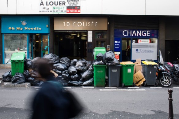 An ongoing garbage workers’ strike has left overflowing bins and a growing piles of rubbish bags on the streets of Paris.