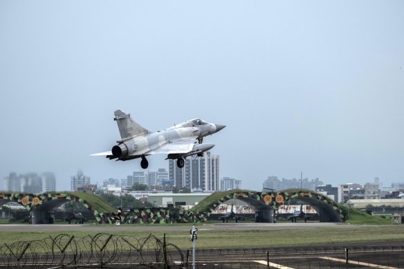 A Taiwanese Air Force fighter jet takes off from Hsinchu Air Base in Hsinchu, Taiwan, on Thursday.