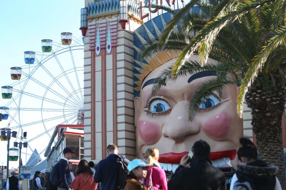 'A cavalier attitude': guests queue to enter Sydney's Luna Park last week.