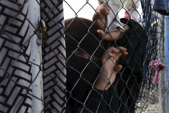 A woman in the foreign section of the al-Hawl IS families camp in Syria.