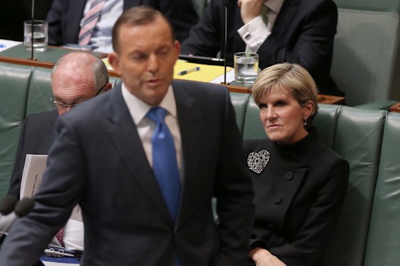 Julie Bishop listens as then prime minister Tony Abbott speaks during question time at Parliament House in 2015. 