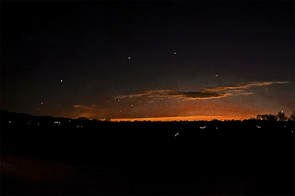 Points of light appear in the evening sky near Lebanon Township, New Jersey.