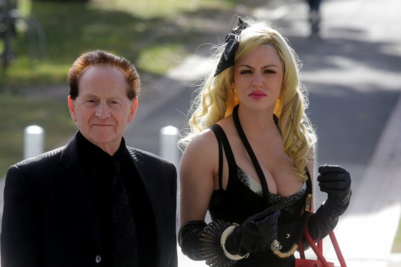 Geoffrey Edelsten and Gabi Grecko at Tom Hafey’s funeral in 2014.