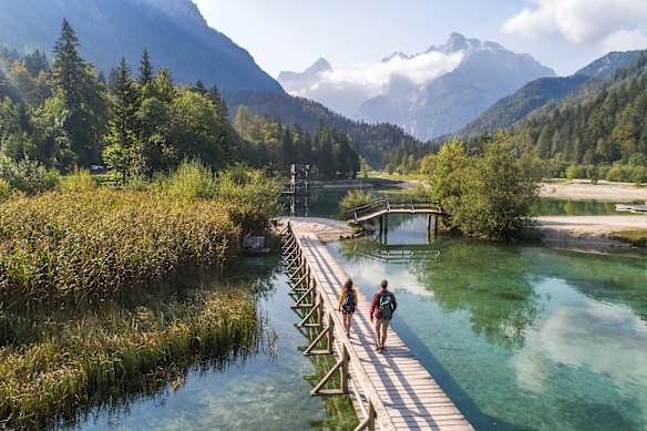 Crossing a bridge near Kranjska Gora,  an alpine resort town in the Julian Alps, near the border of Austria and Italy.