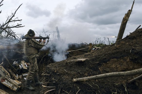 A Ukrainian soldier fires an RPG toward Russian positions at the frontline near Avdiivka, an eastern city where fierce battles against Russian forces have been taking place, in the Donetsk region, Ukraine.