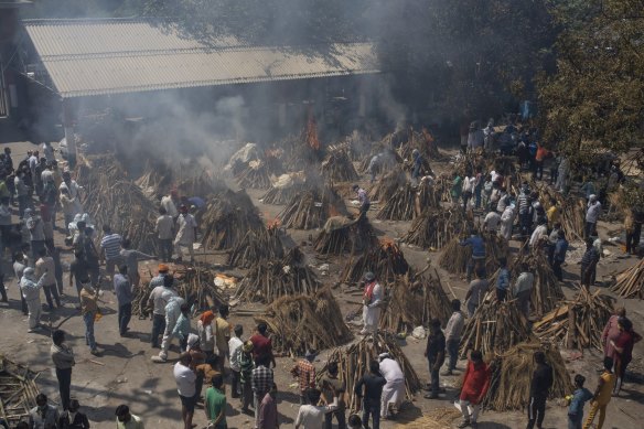 A mass cremation for COVID-19 victims takes place in New Delhi.