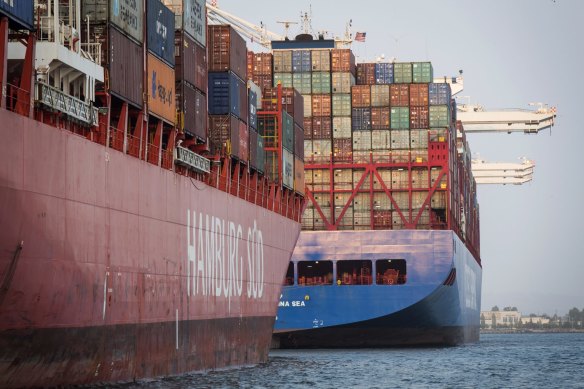 Container ships docked at the Port of Oakland in California. Some of California’s backlog has merely shifted east in search of faster routes.